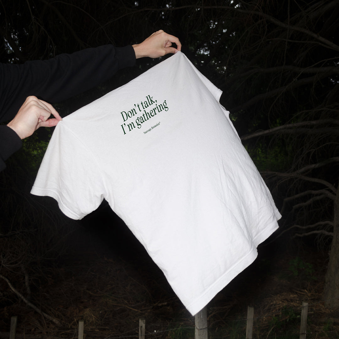 'DON'T TALK, I'M GATHERING' T-SHIRT: WHITE