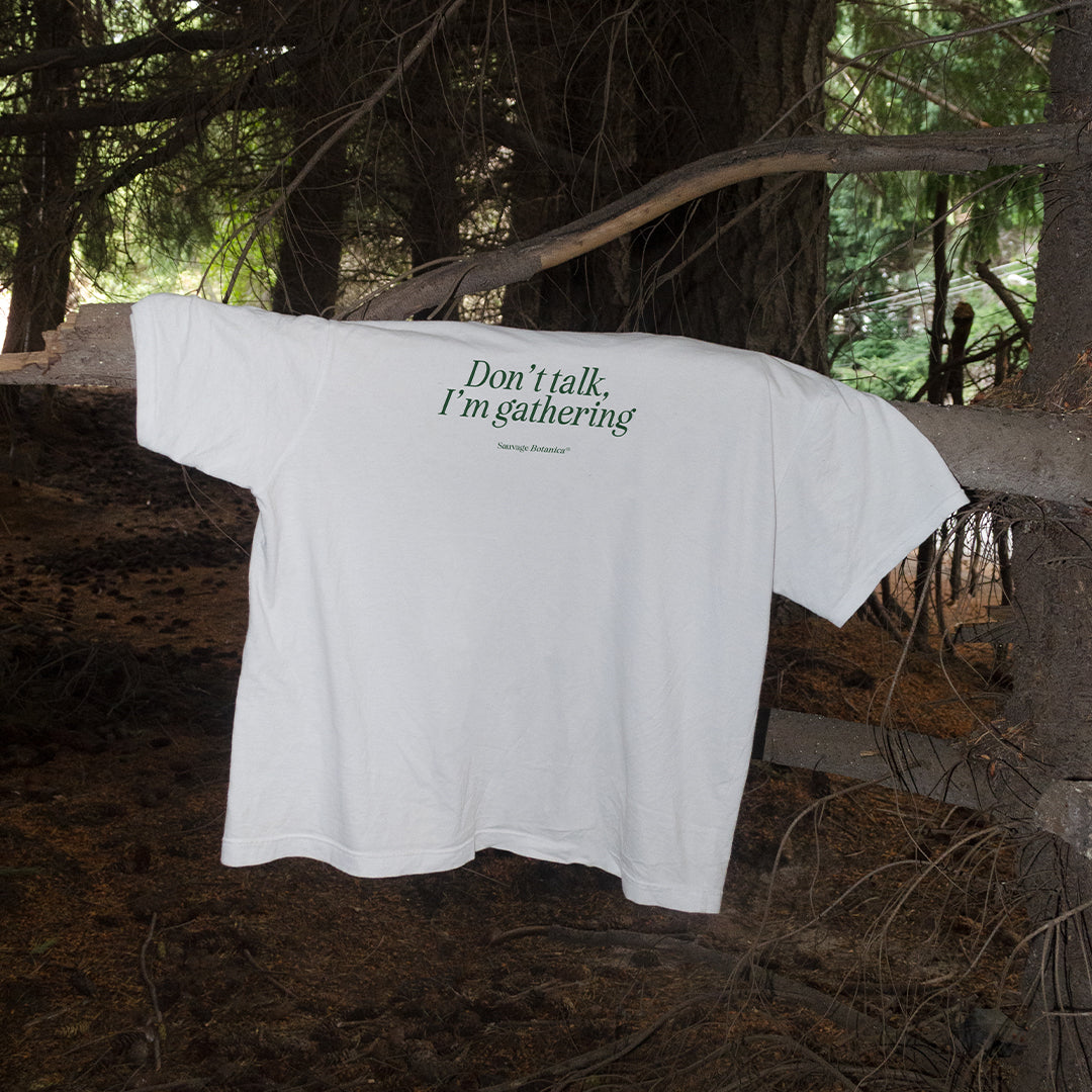 'DON'T TALK, I'M GATHERING' T-SHIRT: WHITE